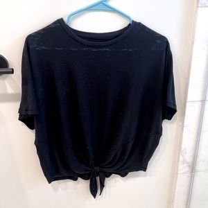 Lululemon black tshirt. Size 6. Tie detail at bottom.
